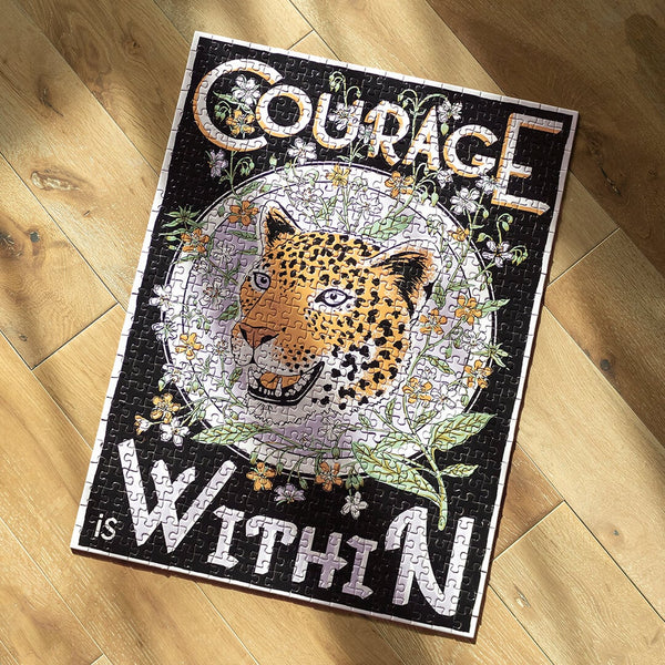 Puzzle "Courage With In" zusammengebaut liegend 