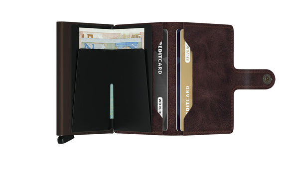 geöffnete Mini Wallet mit Karten und Geld darin